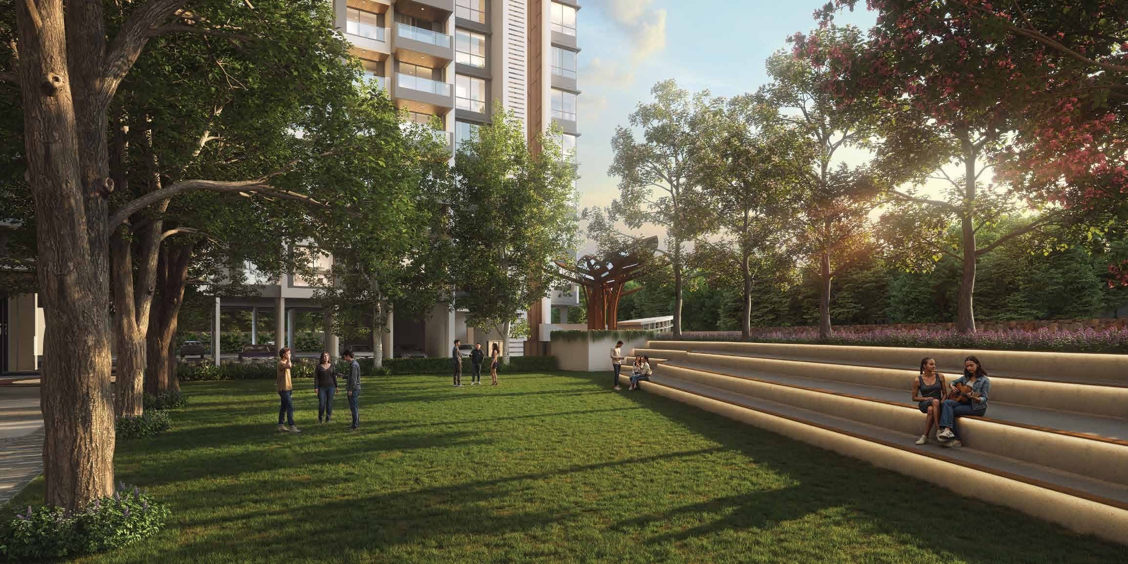 Kohinoor Woodshire, Bhugaon — stepped open-air amphitheatre and community lawn