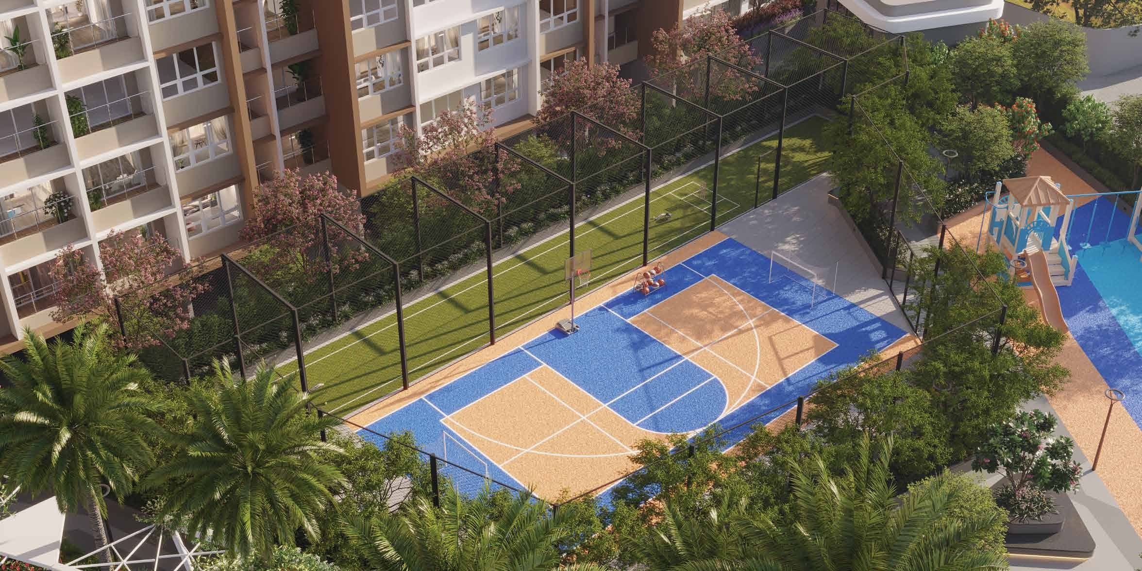 The Winds by Kolte Patil, Bhugaon — aerial perspective of the multi-use sports arena (MUGA) and cricket nets