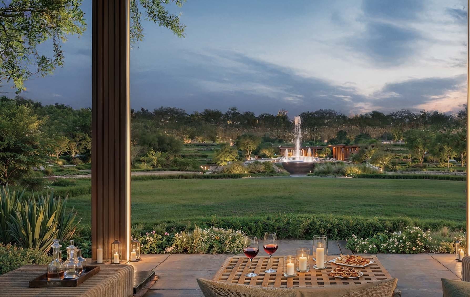 Lodha Sylvan, Hinjewadi — grand lawn, water fountain & hillside twilight terrace lounge